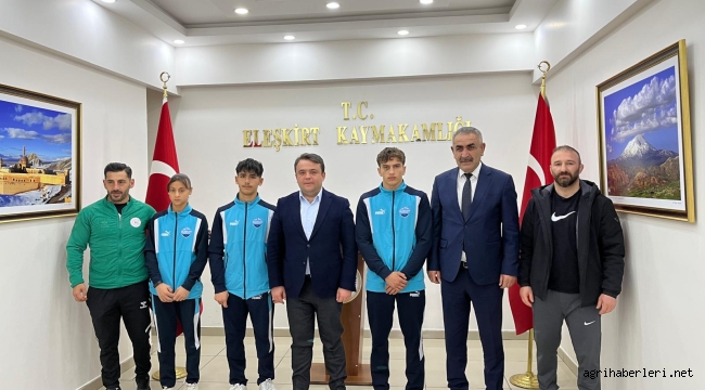 Türkiye Şampiyonlarını Eleşkirt Kaymakamı Saygılı, Makamında Kabul Etti