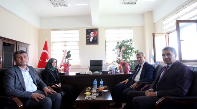 AİÇÜ Rektörü Prof. Dr. Gülçin, Turizm İşletmeciliği ve Otelcilik Yüksekokulu Müd. Prof. Dr. Akif Arslan'ı Ziyaret Etti