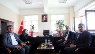 AİÇÜ Rektörü Prof. Dr. Gülçin, Turizm İşletmeciliği ve Otelcilik Yüksekokulu Müd. Prof. Dr. Akif Arslan'ı Ziyaret Etti